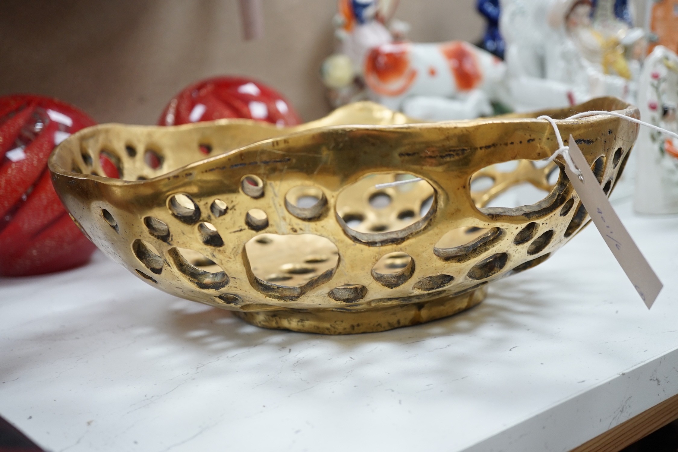 A pair of globular coloured glass ornaments and an art-bronze bowl, 33cm diameter